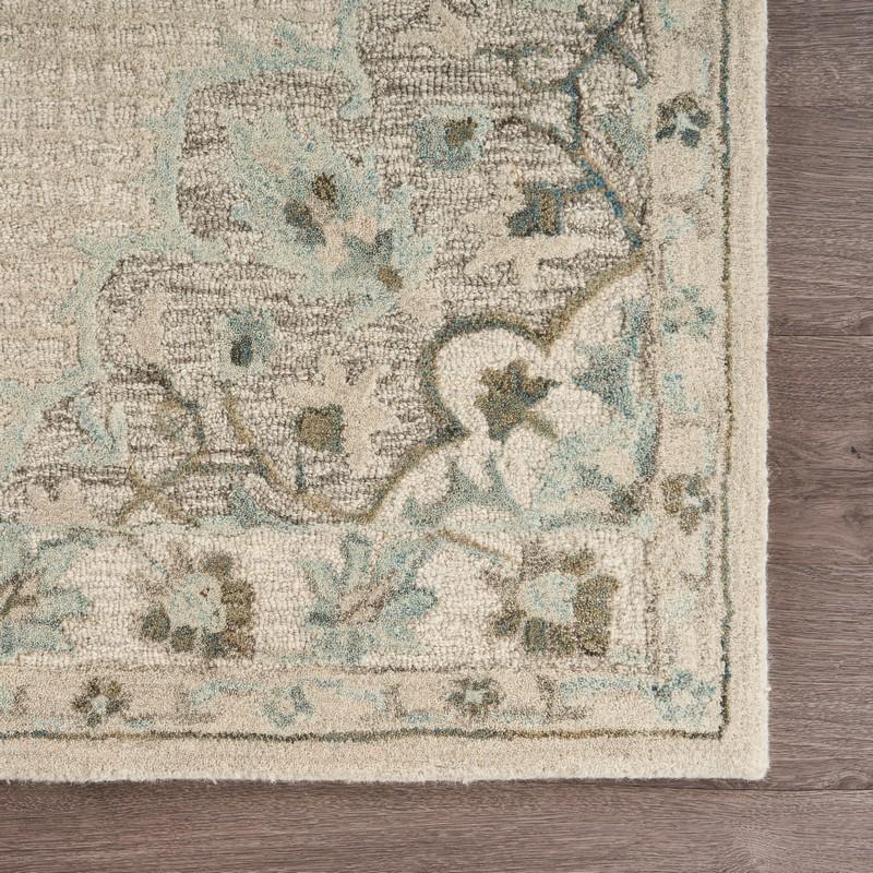 9’ x 12’ Ivory Distressed Floral Area Rug