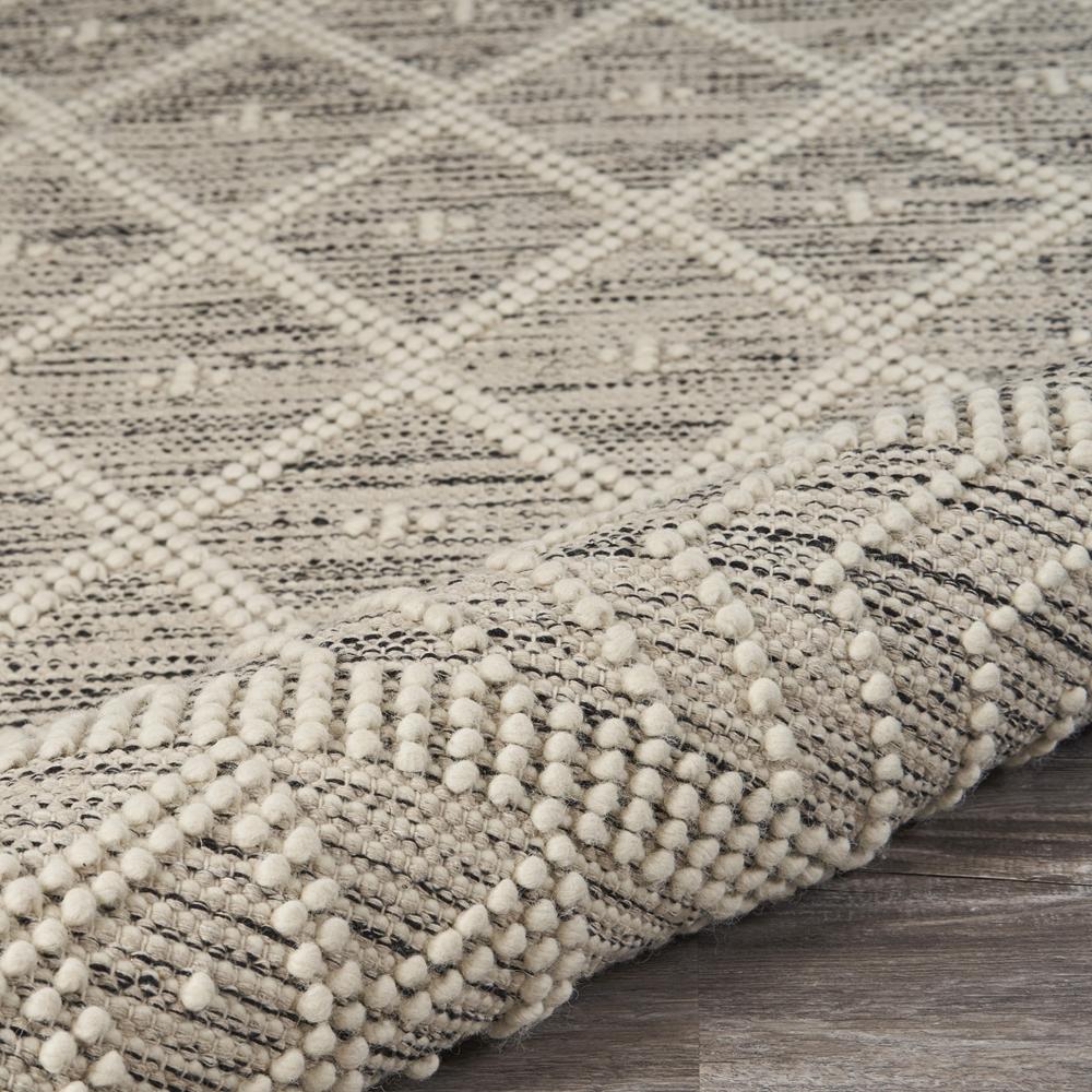 7’ x 9’ Ivory Bohemian Diamonds Area Rug