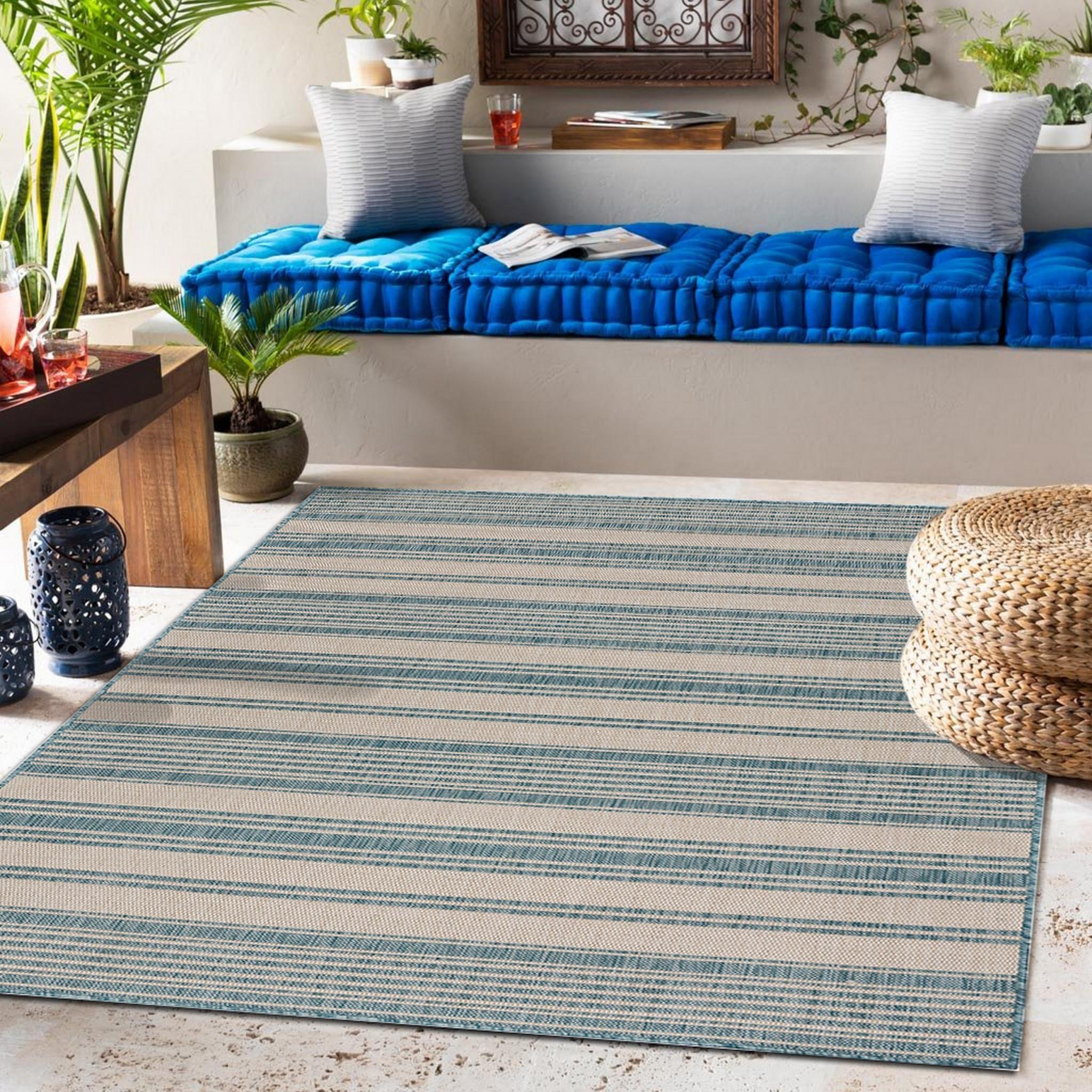 5’ x 7’ Teal Uneven Stripe Indoor Outdoor Area Rug