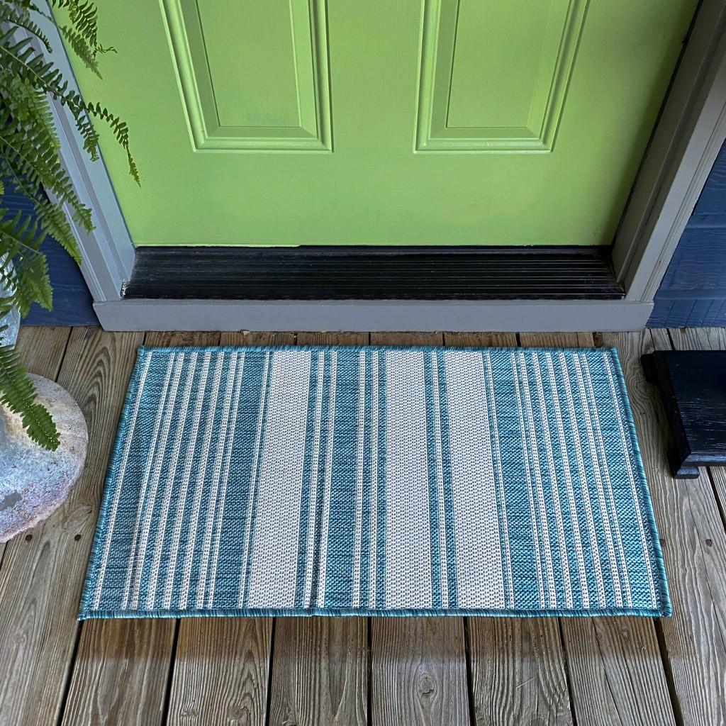 2’ x 3’ Teal Uneven Stripe Indoor Outdoor Scatter Rug