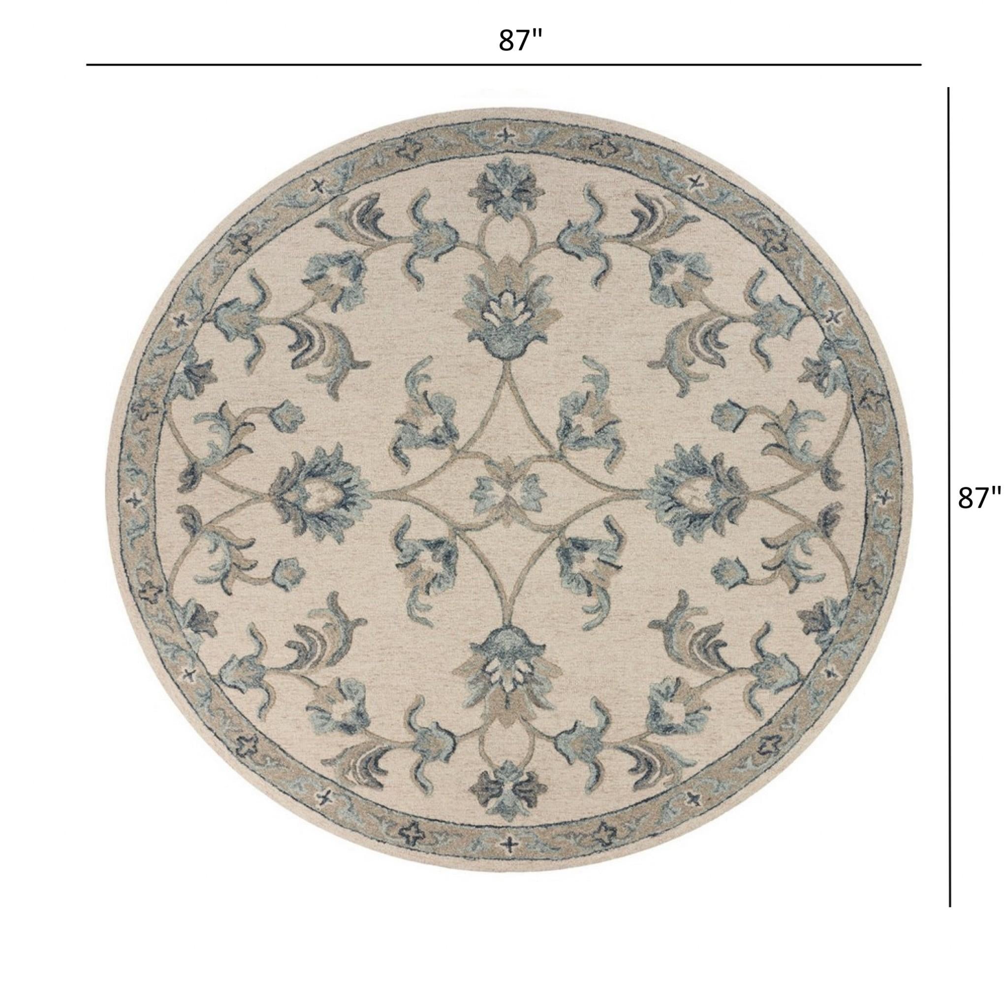 7’ Round Beige and Blue Filigree Area Rug