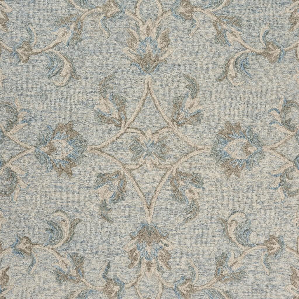 7’ Round Blue and Cream Filigree Area Rug