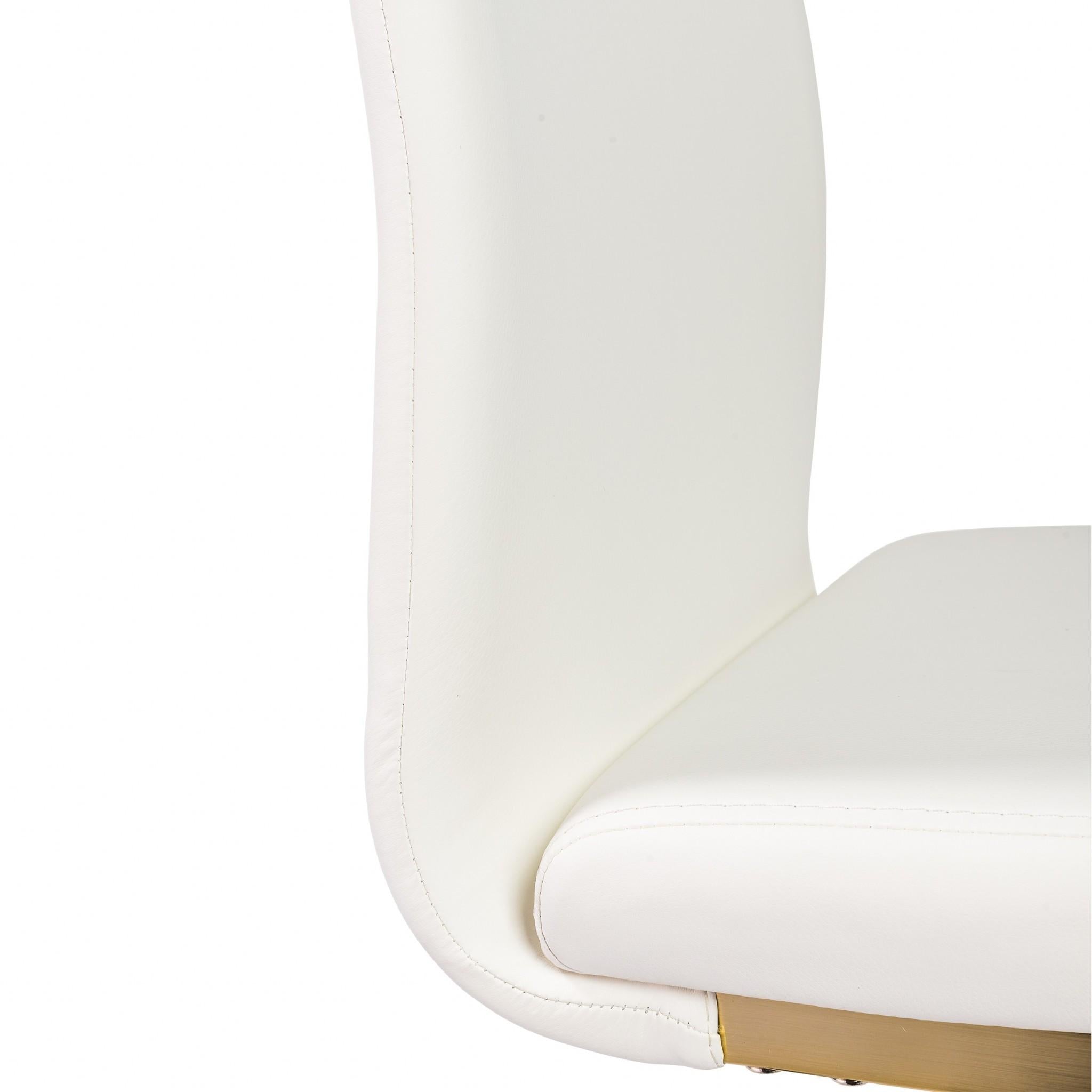 Set of Four White Faux Faux Leather Gold Cantilever Chairs