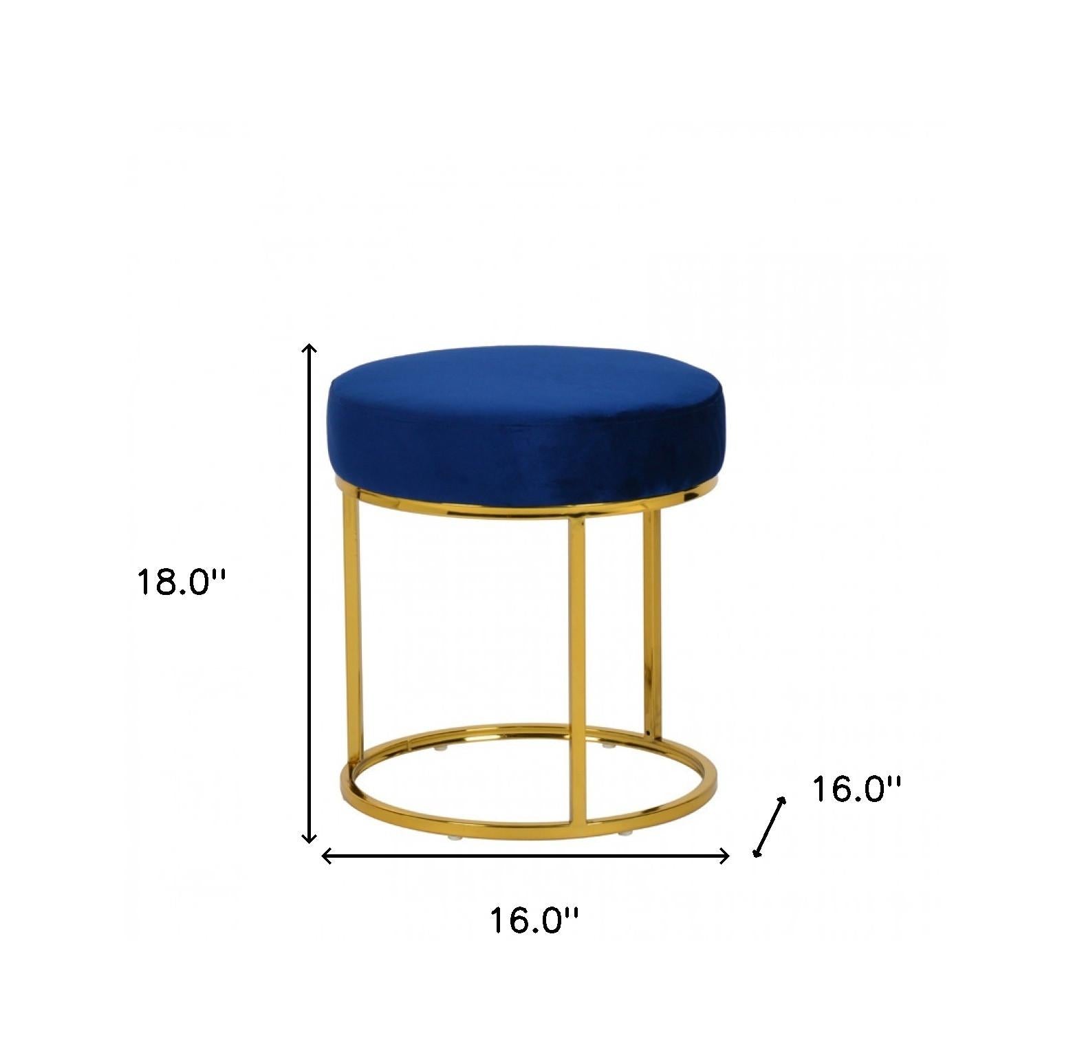 Compact Blue Velvet And Gold Round Ottoman