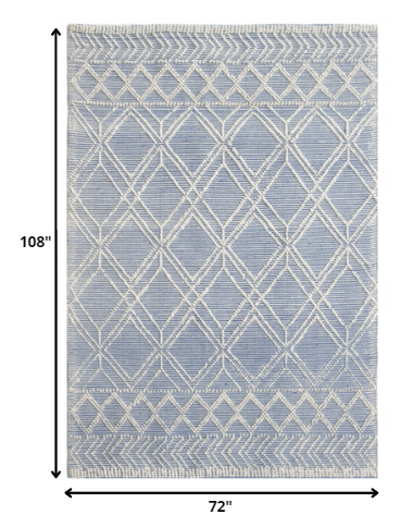 6’ x 9’ Blue Ivory Tribal Geometric Pattern Area Rug