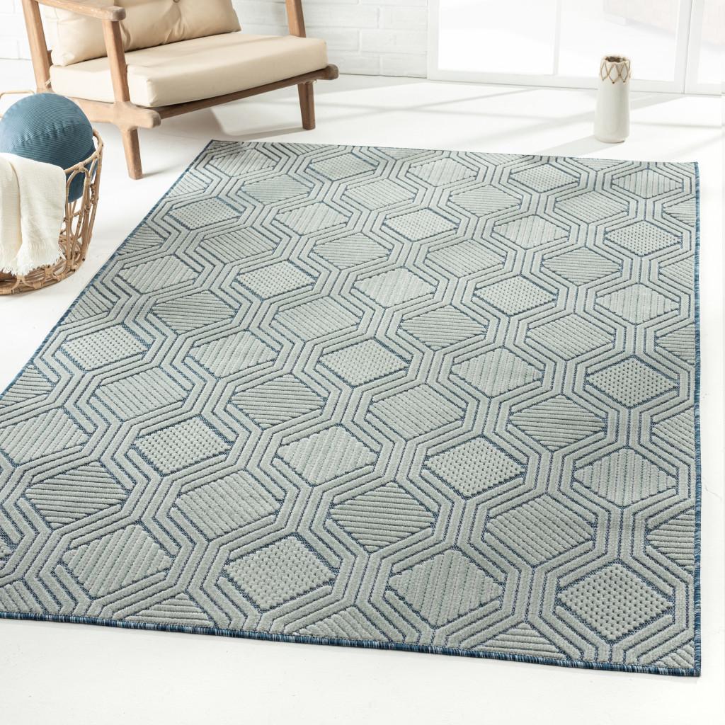 5' X 7' Light Blue And Navy Geometric Stain Resistant Area Rug
