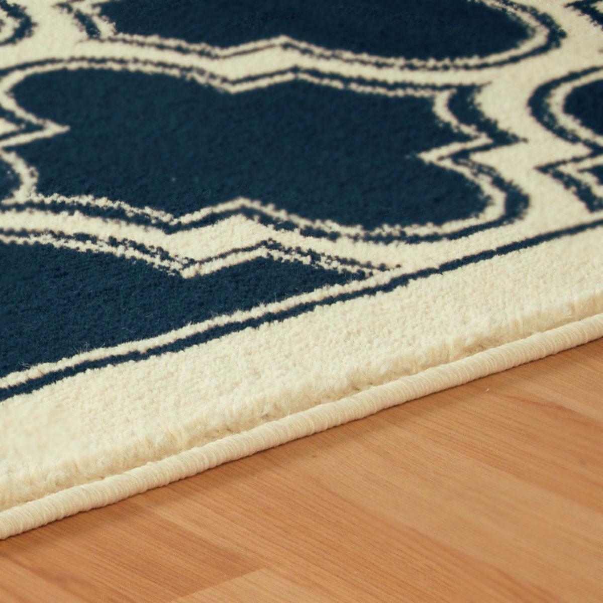 4' X 6' Dark Blue And Cream Geometric Stain Resistant Area Rug