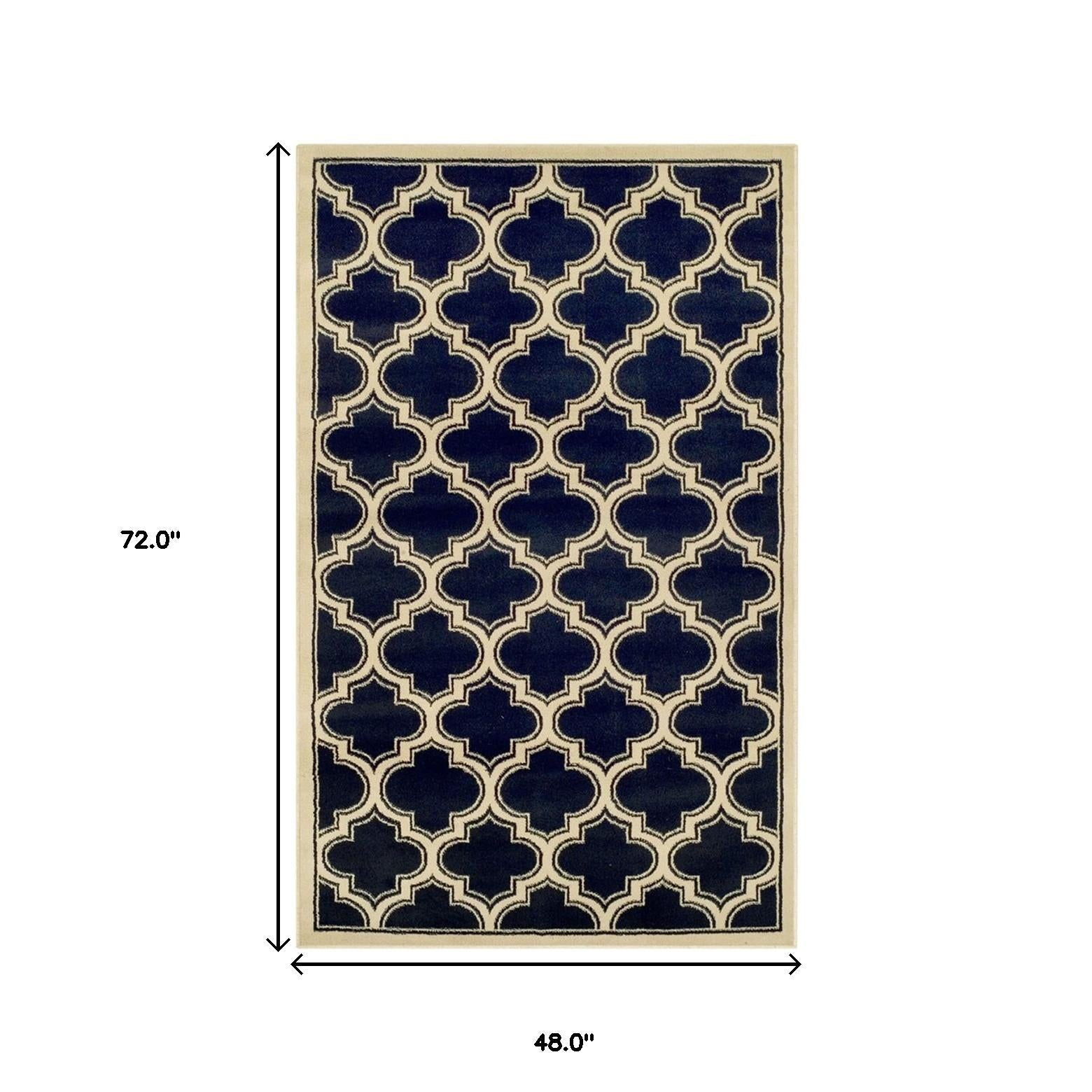 4' X 6' Dark Blue And Cream Geometric Stain Resistant Area Rug