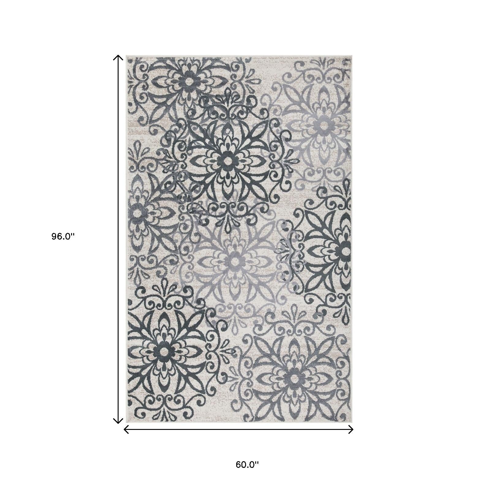 5' X 8' Oatmeal And Gray Medallion Power Loom Stain Resistant Area Rug