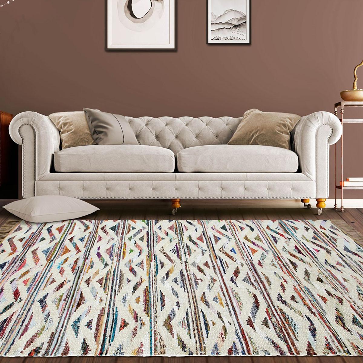 5' X 8' White And Southwest Palette Geometric Hand Woven Area Rug